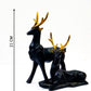Set of 2 black deer showpieces for home and office décor, elegant addition.