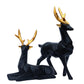 Set of 2 black deer showpieces for home and office décor, elegant addition.