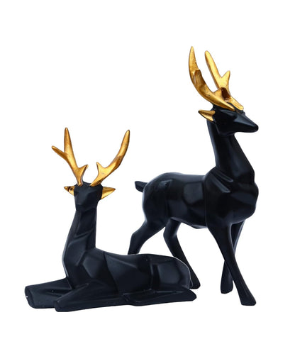 Set of 2 black deer showpieces for home and office décor, elegant addition.