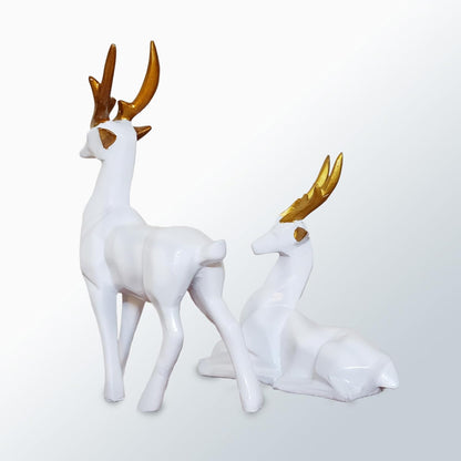 Set of 2 black deer showpieces for home and office décor, elegant addition.