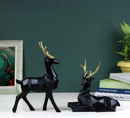 Set of 2 black deer showpieces for home and office décor, elegant addition.