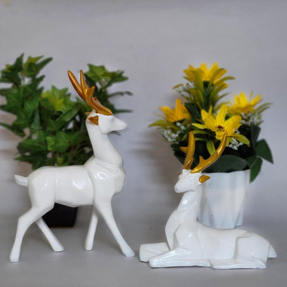 Set of 2 black deer showpieces for home and office décor, elegant addition.