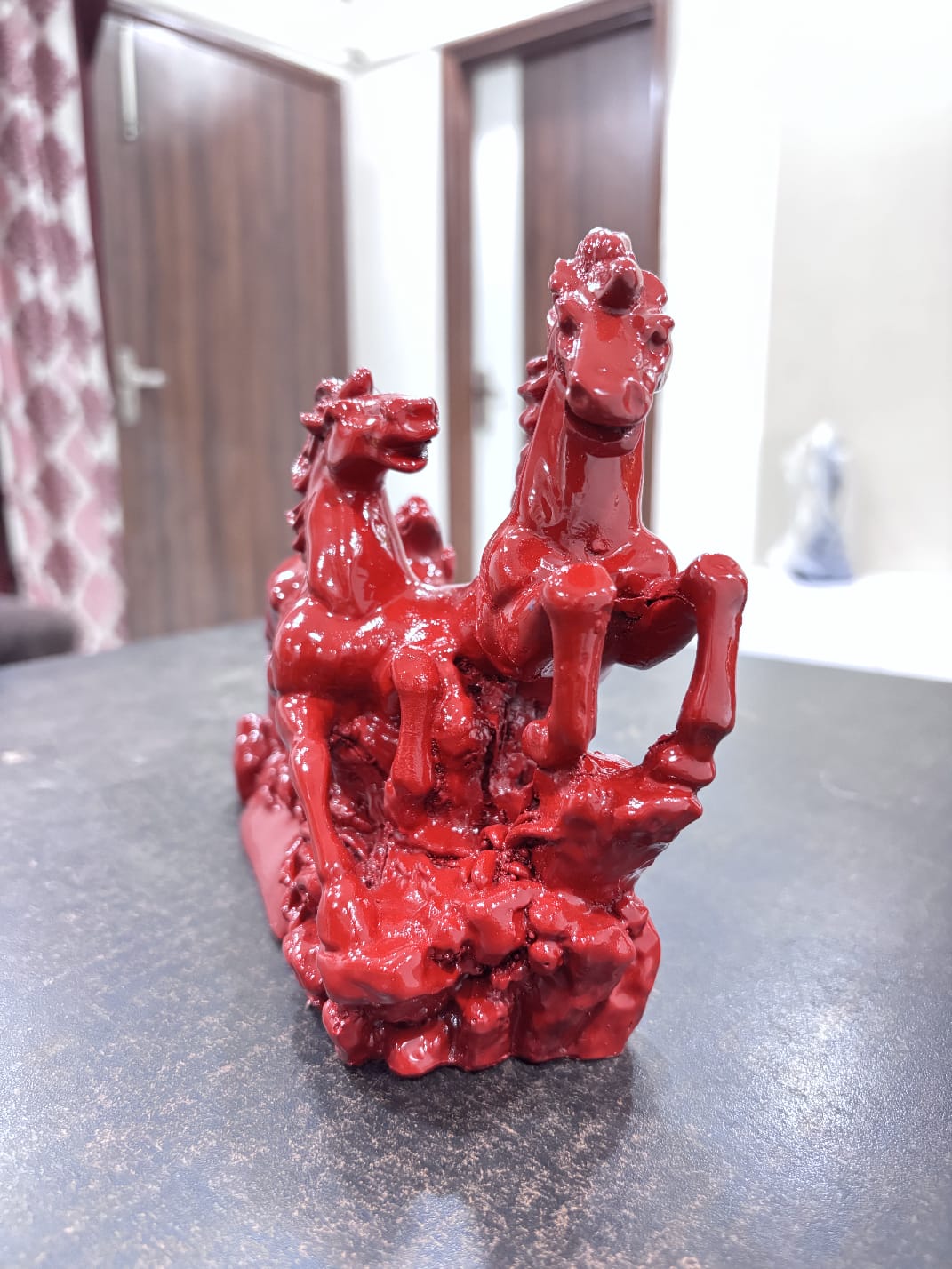 Red Galloping Horse Sculpture – Symbol of Strength & Progress