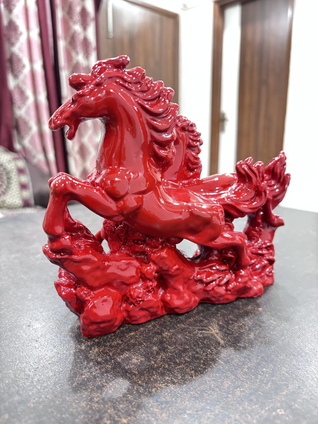 Red Galloping Horse Sculpture – Symbol of Strength & Progress