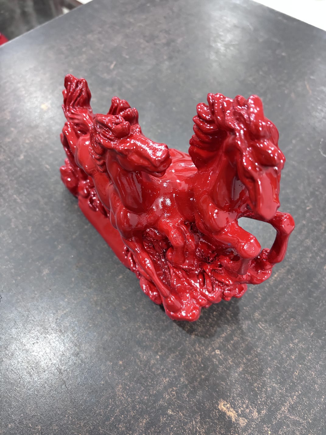 Red Galloping Horse Sculpture – Symbol of Strength & Progress